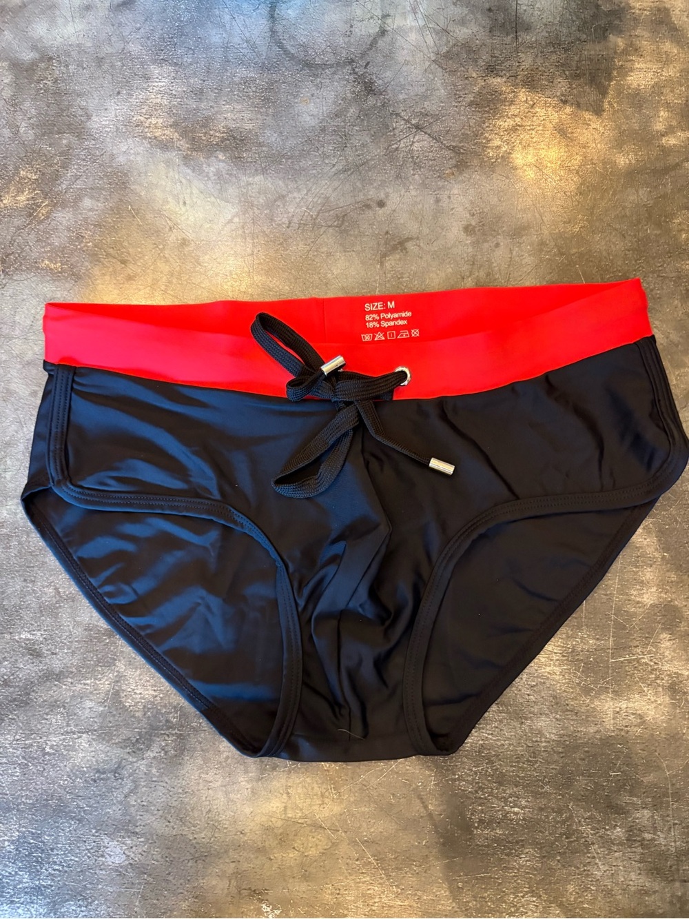 Men’s swim brief, red/black, medium, B5
